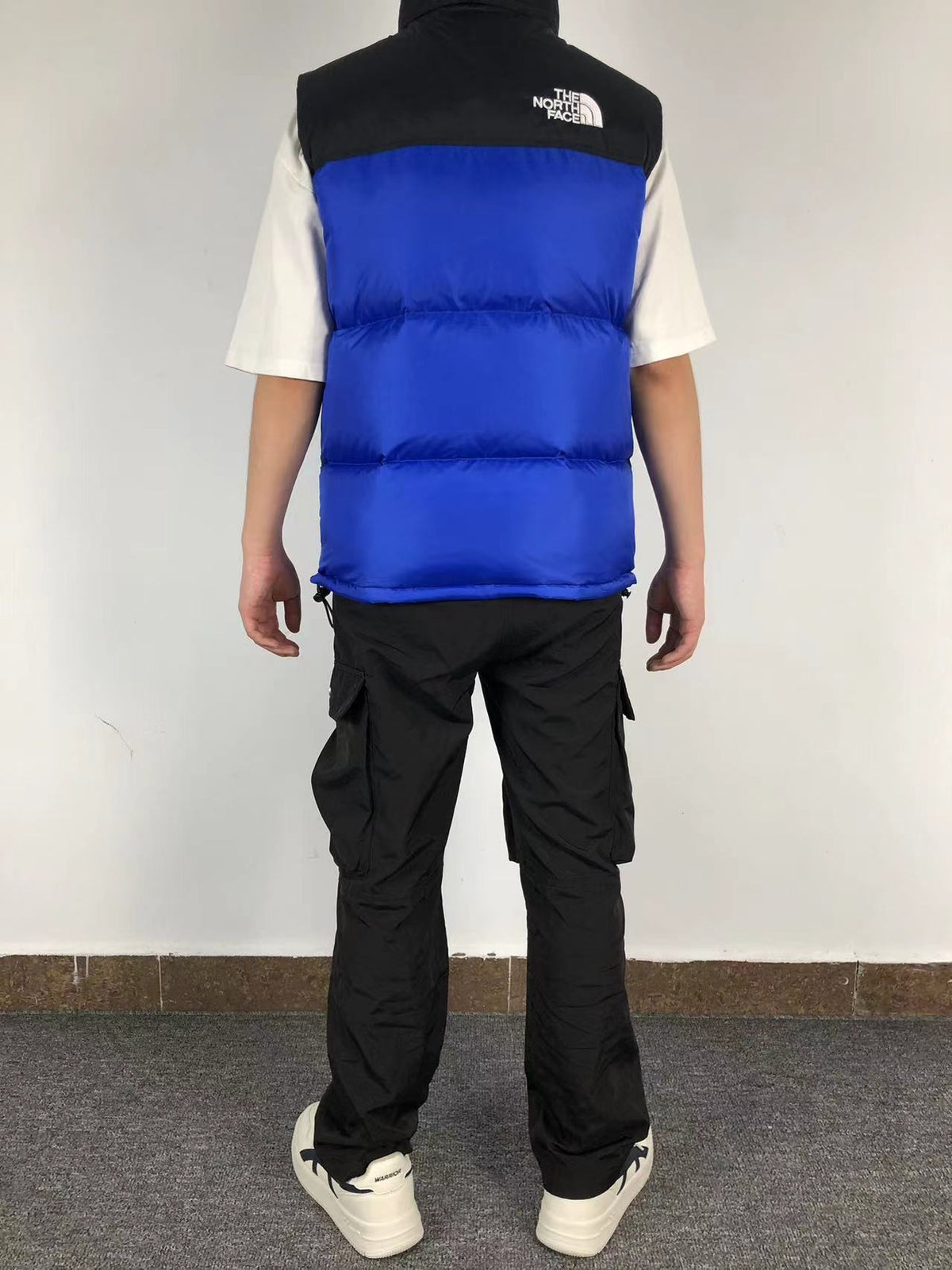 Cobalt Blue puffer gilet worn, back