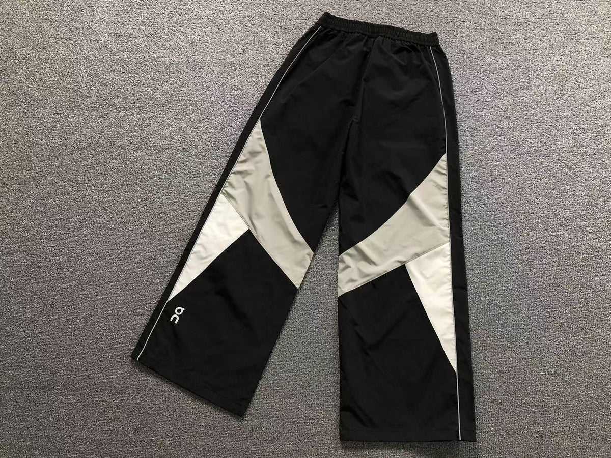 Black colour block wide leg track pants, side