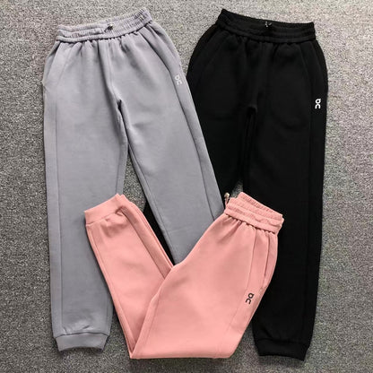 Women's cuffed joggers in grey, black and pink