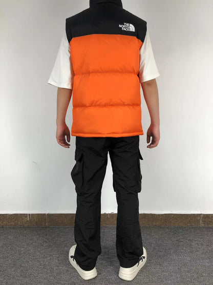 Orange puffer gilet worn, back