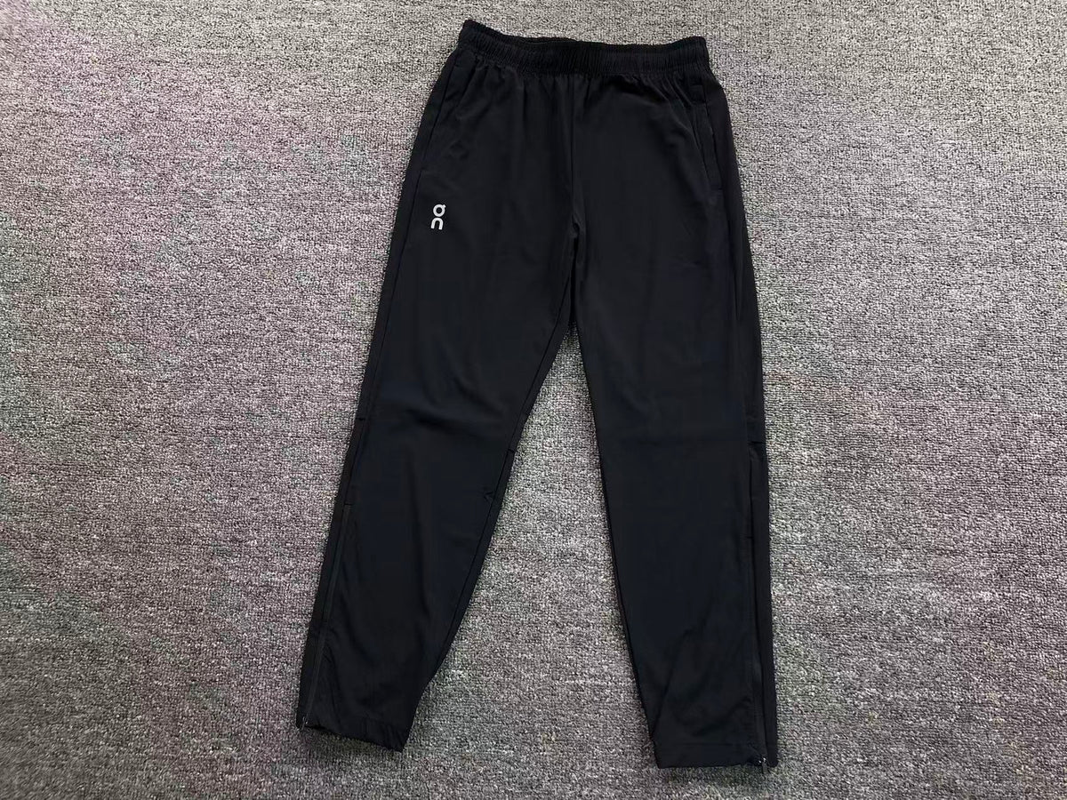 Black tapered track pants
