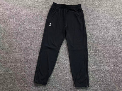 Black tapered track pants