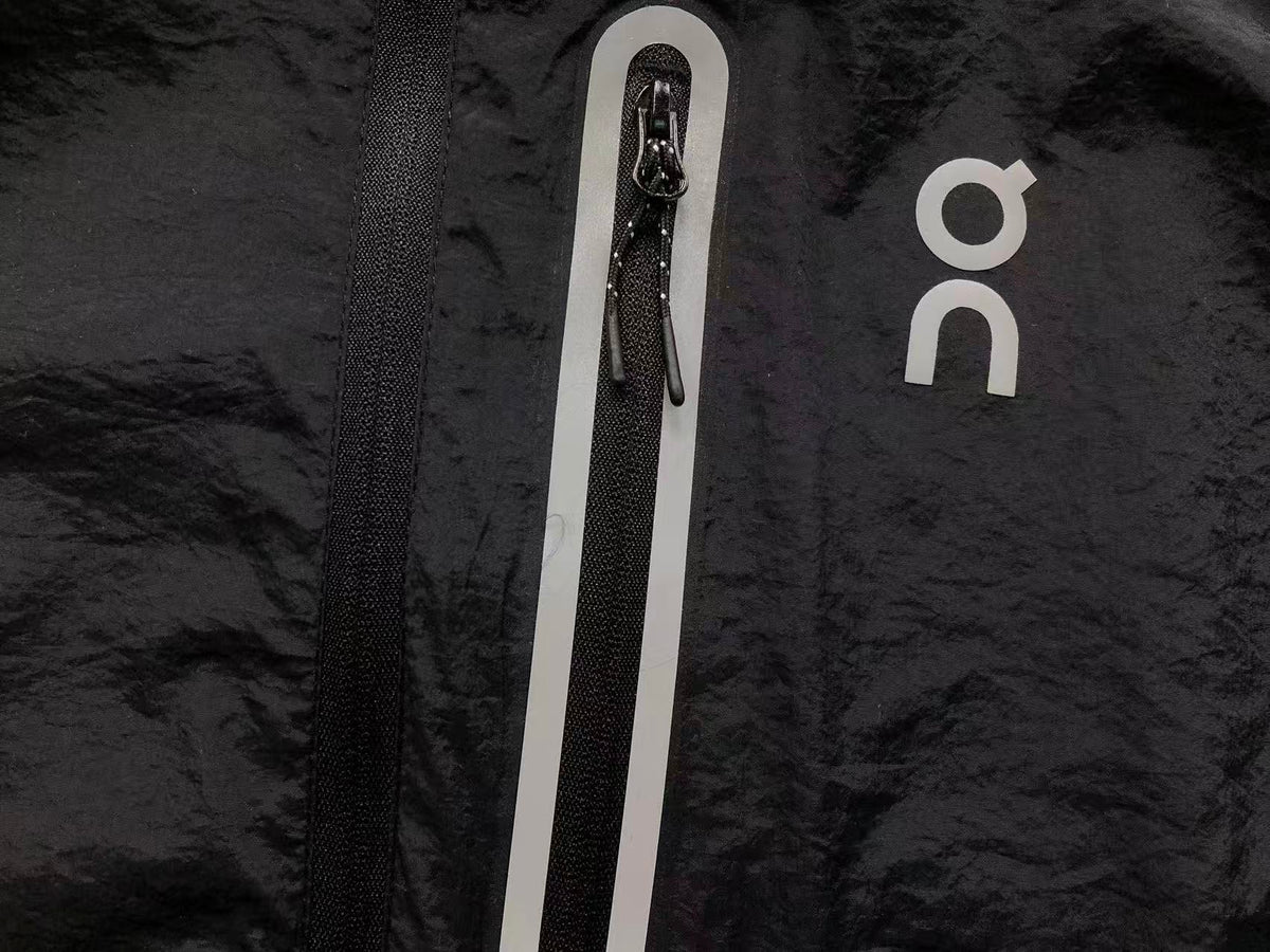 Zip chest pocket with reflective trim