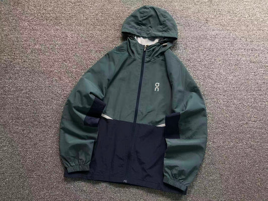 Teal and navy colour block hooded windbreaker