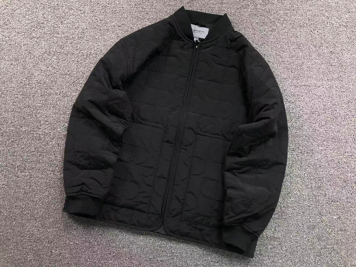 Black quilted liner jacket, angled front