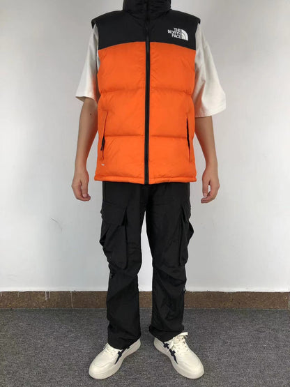 Orange puffer gilet worn, front