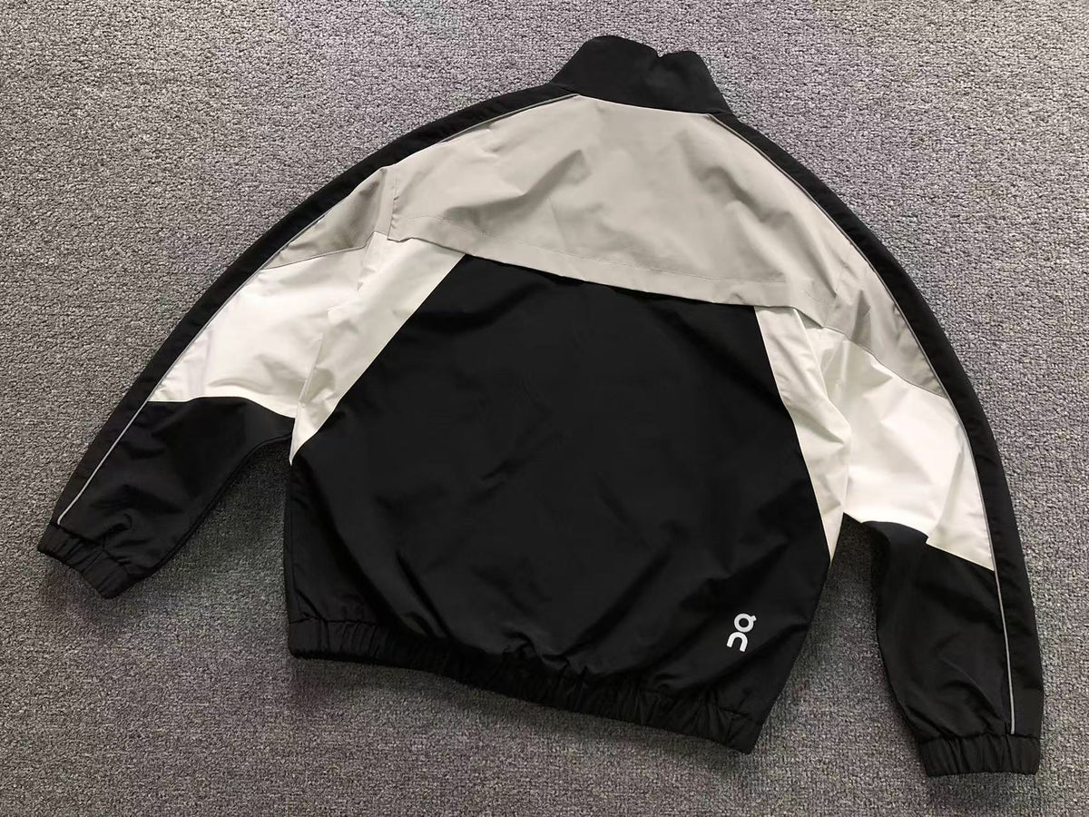 Black colour block track jacket, back