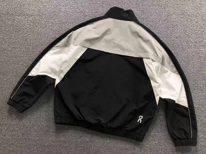 Black colour block track jacket, back