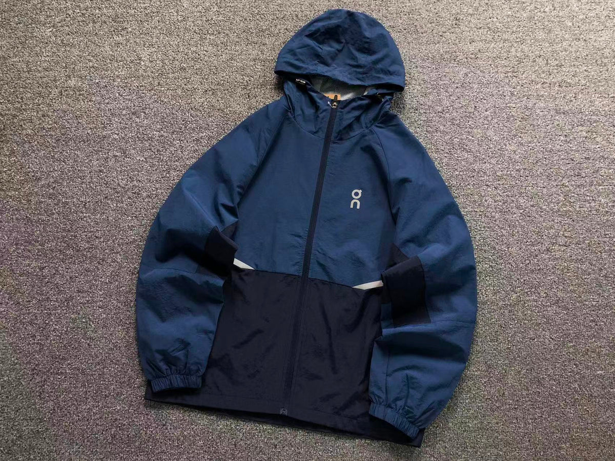 Blue and navy colour block hooded windbreaker