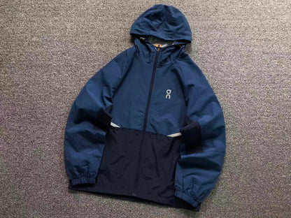 Blue and navy colour block hooded windbreaker