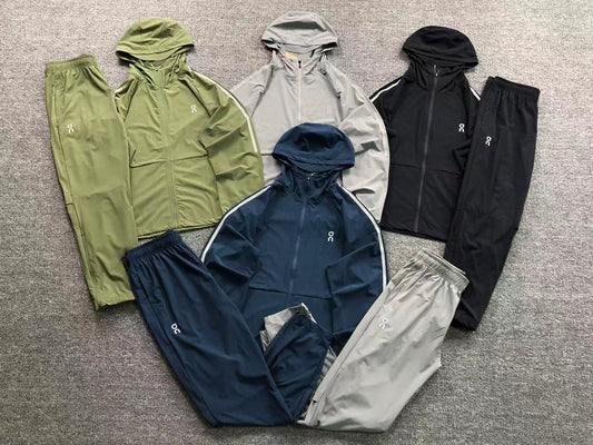 Lightweight hooded tracksuits in olive, grey, black and navy
