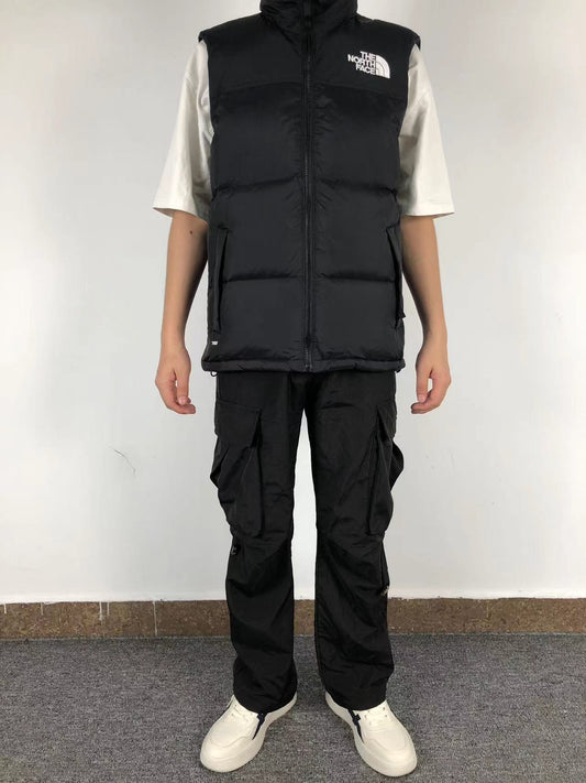 Black puffer gilet worn, front