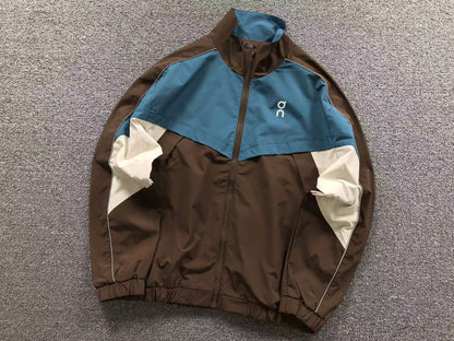 Brown colour block track jacket with blue and cream panels