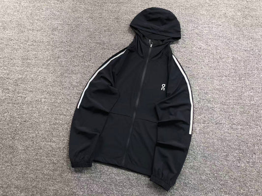 Black lightweight hooded jacket with reflective sleeve stripes