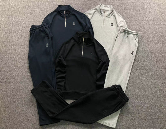 Quarter zip tracksuit set in black, navy and grey