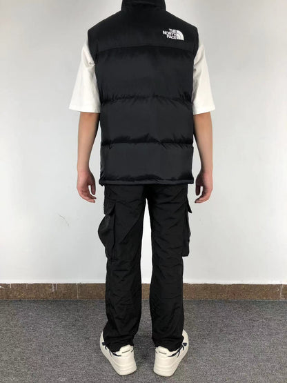Black puffer gilet worn, back