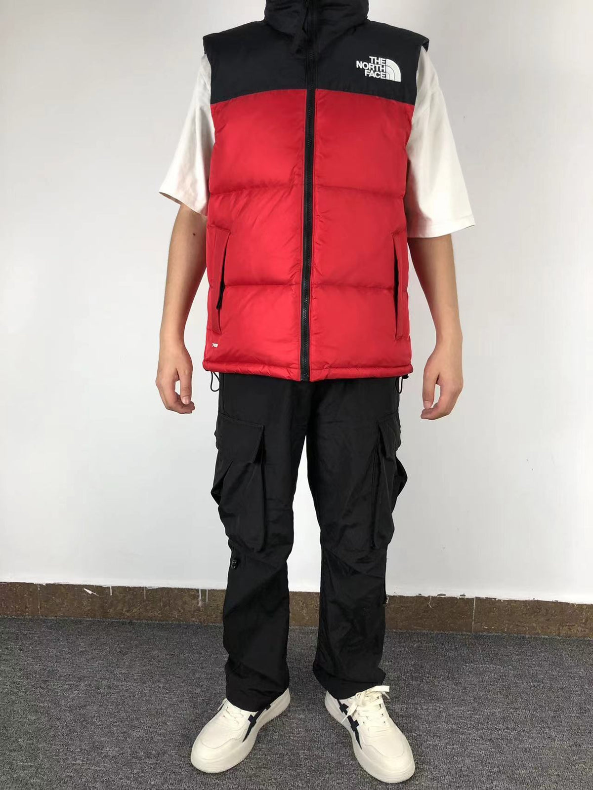 Red puffer gilet worn, front
