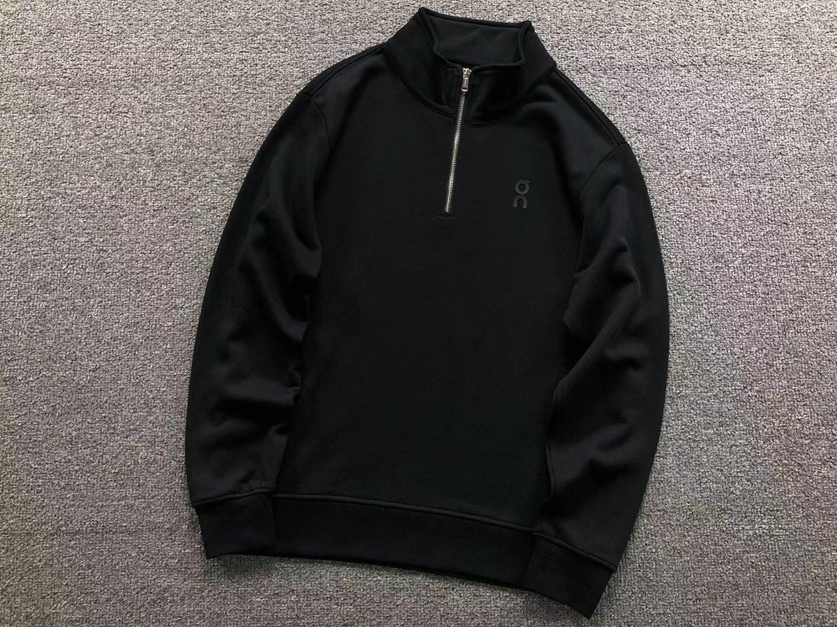 Black quarter zip top