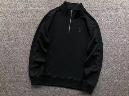 Black quarter zip top