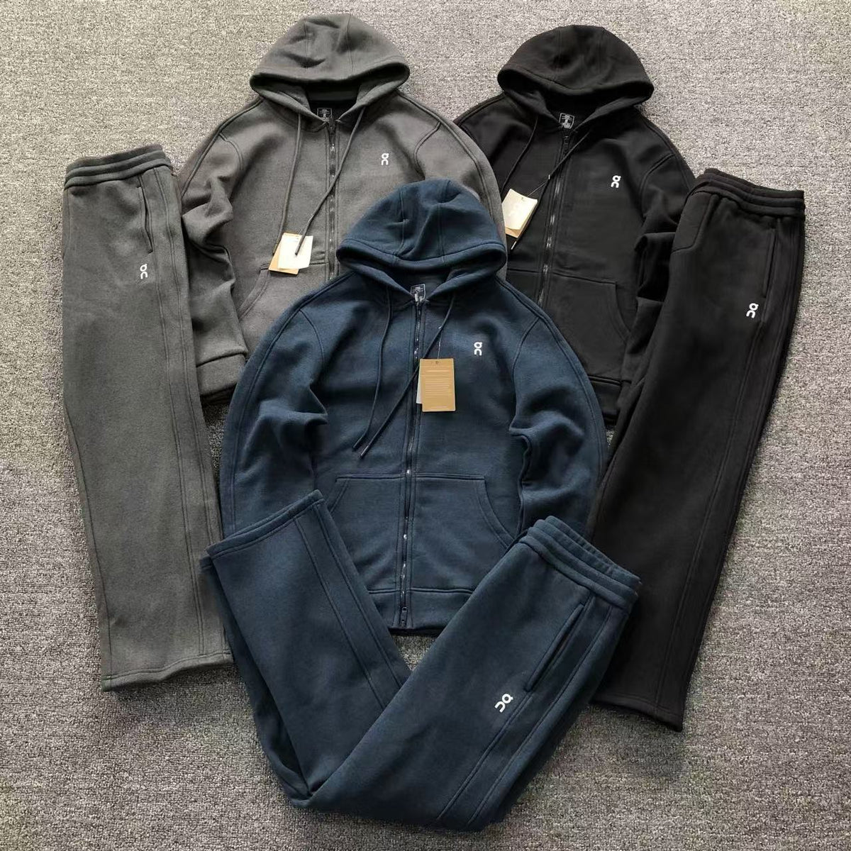 Zip hoodie tracksuits in charcoal, black and navy
