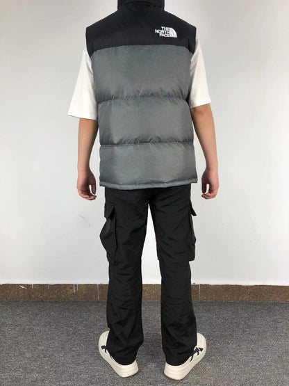 Grey puffer gilet worn, back