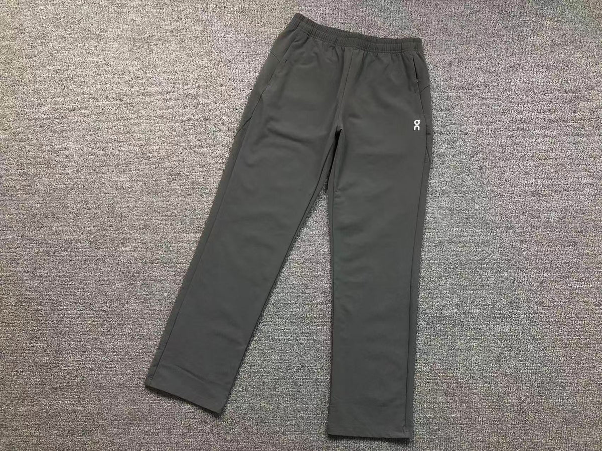 Women's straight leg pants in charcoal, flat lay