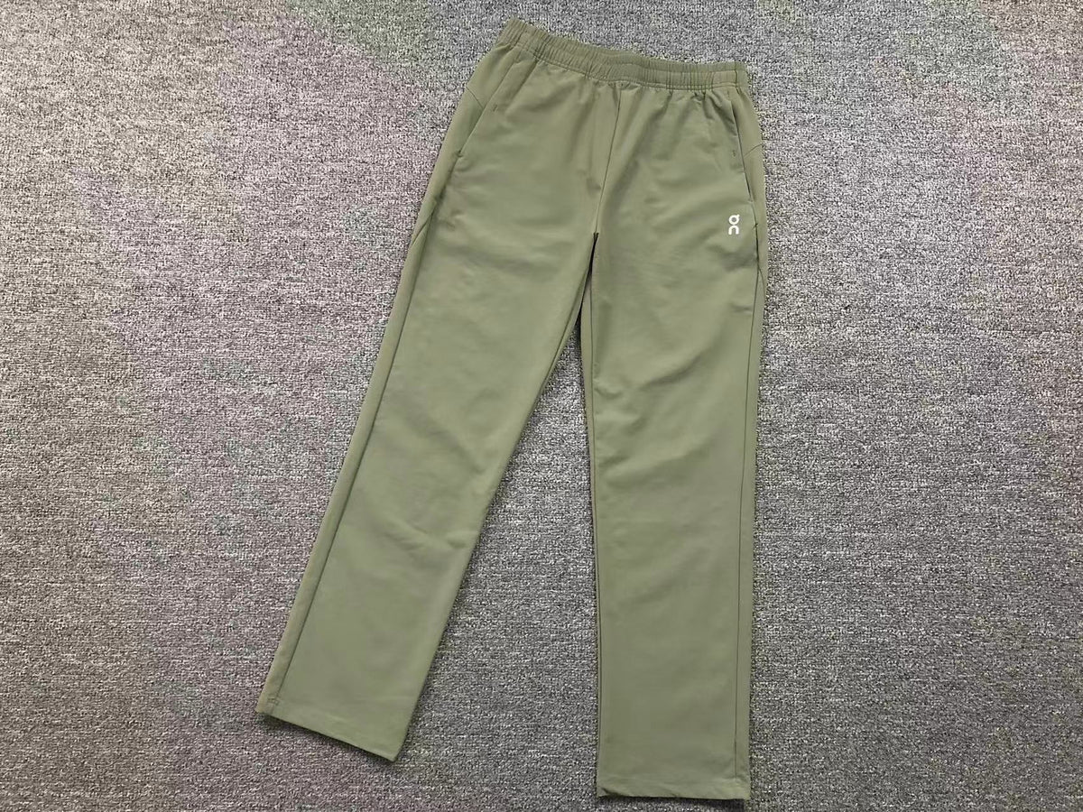 Women's straight leg pants in olive, flat lay