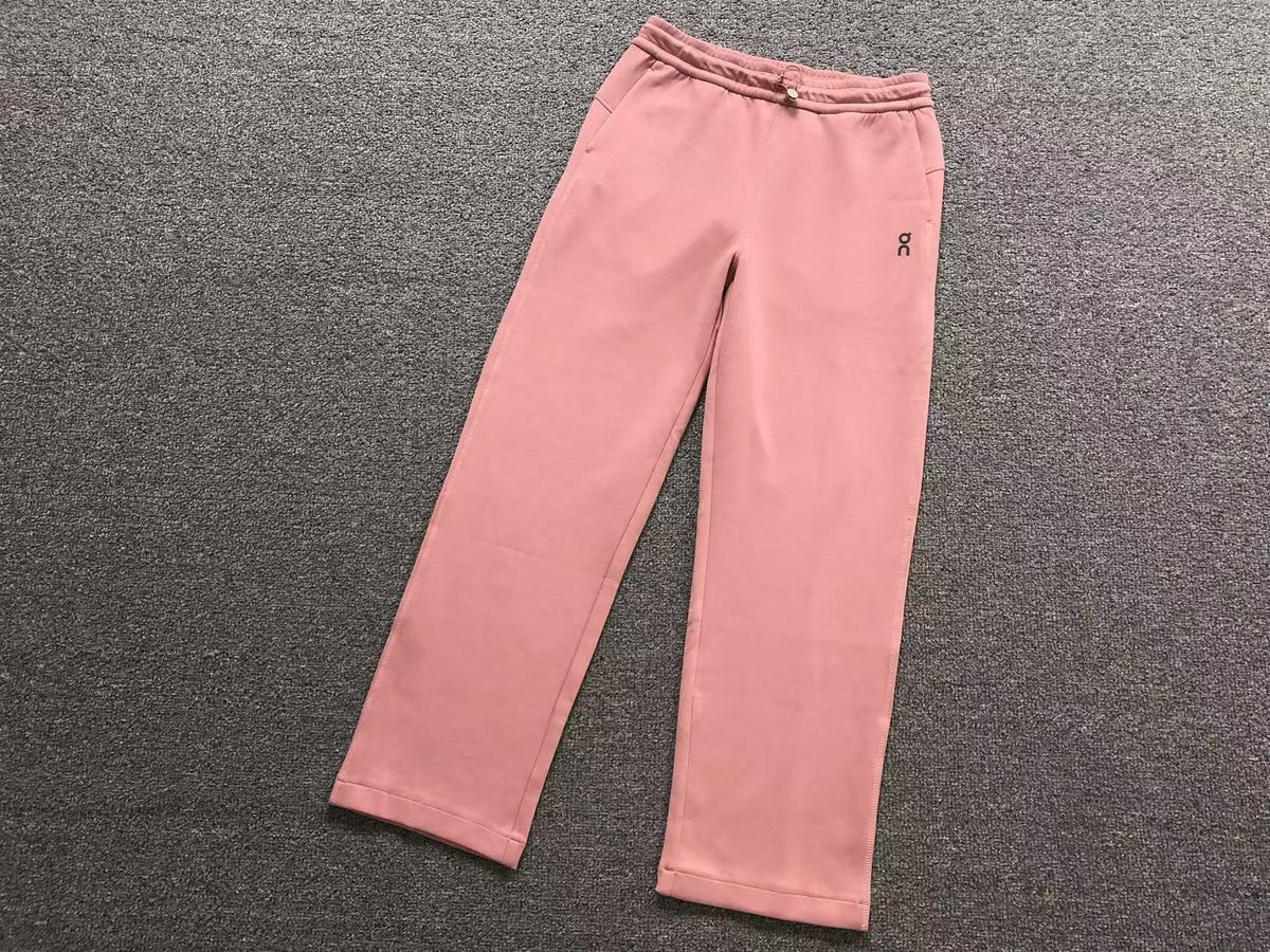 Women's straight leg pants in pink, flat lay