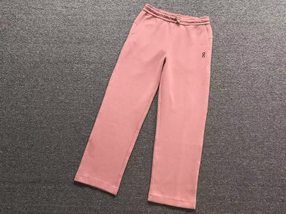 Women's straight leg pants in pink, flat lay
