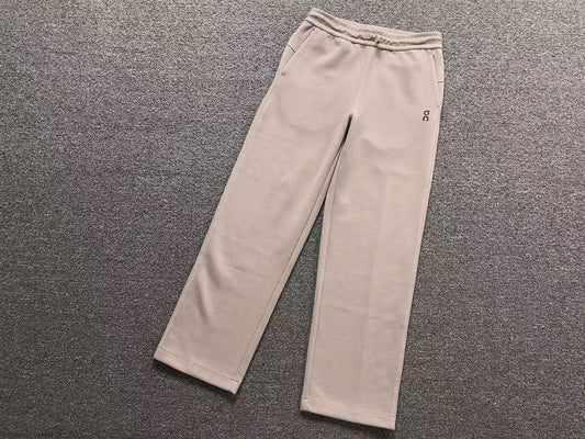 Women's straight leg pants in sand, flat lay